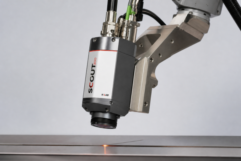 Scout 300 laser scanner mounted on robotic arm during laser welding